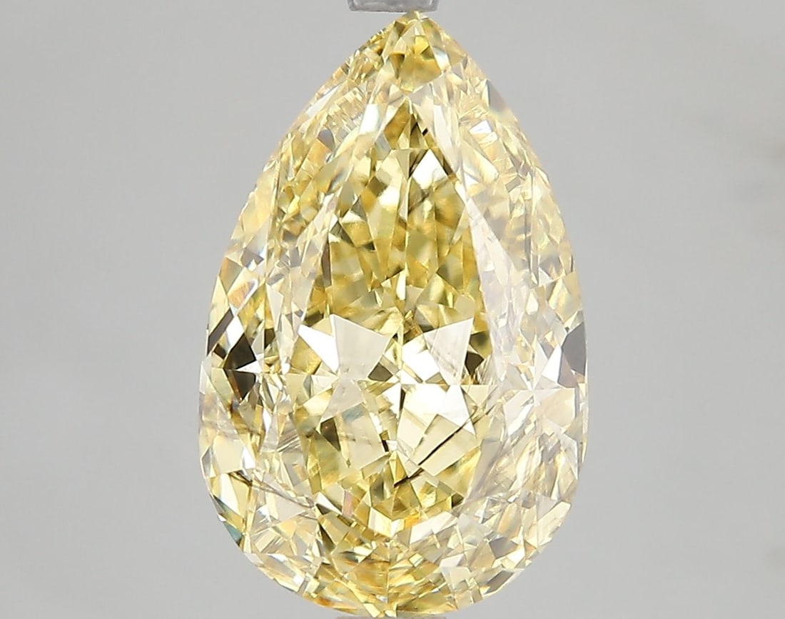 Loose Diamond - PEAR 5.02ct Fancy Vivid Yellow SI1: Loose Diamond - PEAR 5.02ct Fancy Vivid Yellow SI1 Source: This is a real non-mined Diamond that has been grown in a lab Shape: PEAR Carats: 5.02 Color: Fancy Vivid Yellow Certification: IGI Video: