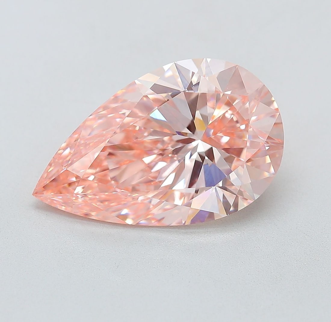 Loose Diamond - PEAR 5.56ct Fancy Vivid Pink VVS2: Loose Diamond - PEAR 5.56ct Fancy Vivid Pink VVS2 Source: This is a real non-mined Diamond that has been grown in a lab Shape: PEAR Carats: 5.56 Color: Fancy Vivid Pink Certification: IGI Video: