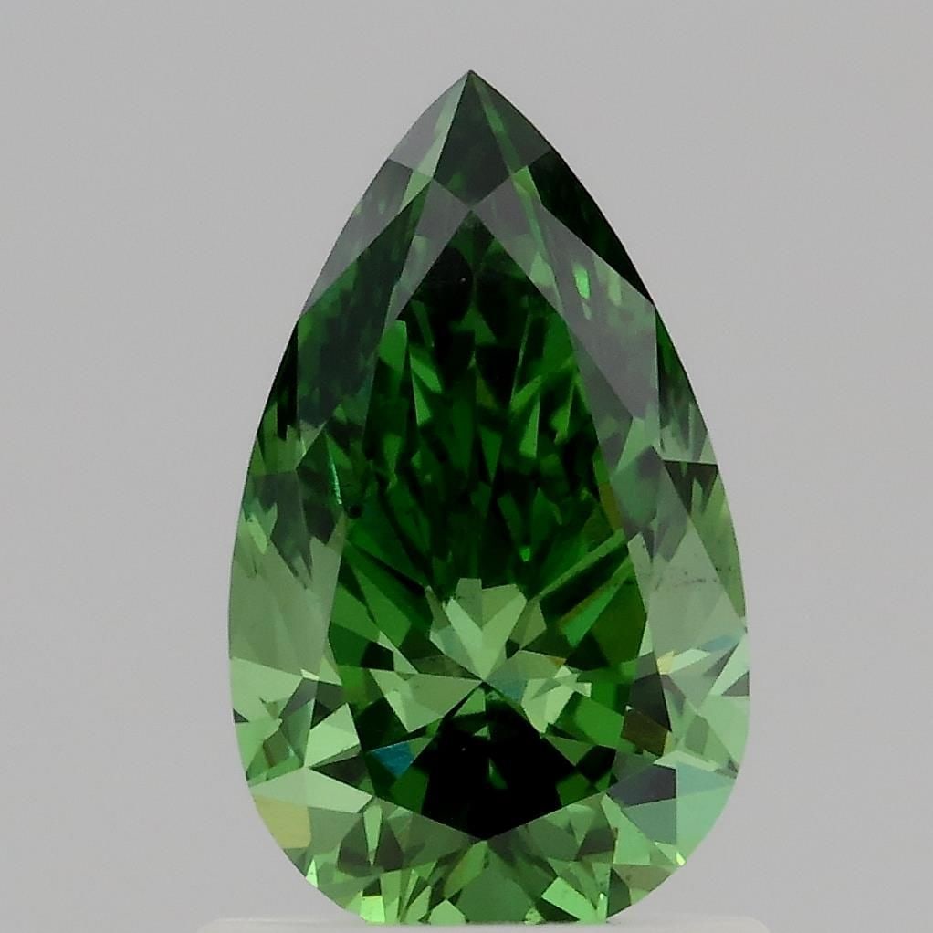 Loose Diamond - PEAR 1.01ct Fancy Vivid Green VS2: Loose Diamond - PEAR 1.01ct Fancy Vivid Green VS2 Source: This is a real non-mined Diamond that has been grown in a lab Shape: PEAR Carats: 1.01 Color: Fancy Vivid Green Certification: IGI Video: