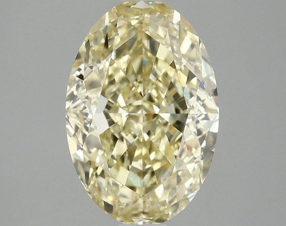 Loose Diamond - OVAL 3.07ct Fancy Vivid Yellow VS1: Loose Diamond - OVAL 3.07ct Fancy Vivid Yellow VS1 Source: This is a real non-mined Diamond that has been grown in a lab Shape: OVAL Carats: 3.07 Color: Fancy Vivid Yellow Certification: IGI Video: