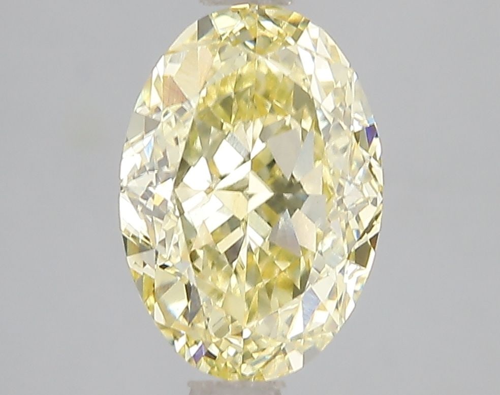Loose Diamond - OVAL 3.01ct Fancy Intense Yellow VS1: Loose Diamond - OVAL 3.01ct Fancy Intense Yellow VS1 Source: This is a real non-mined Diamond that has been grown in a lab Shape: OVAL Carats: 3.01 Color: Fancy Intense Yellow Certification: IGI Video