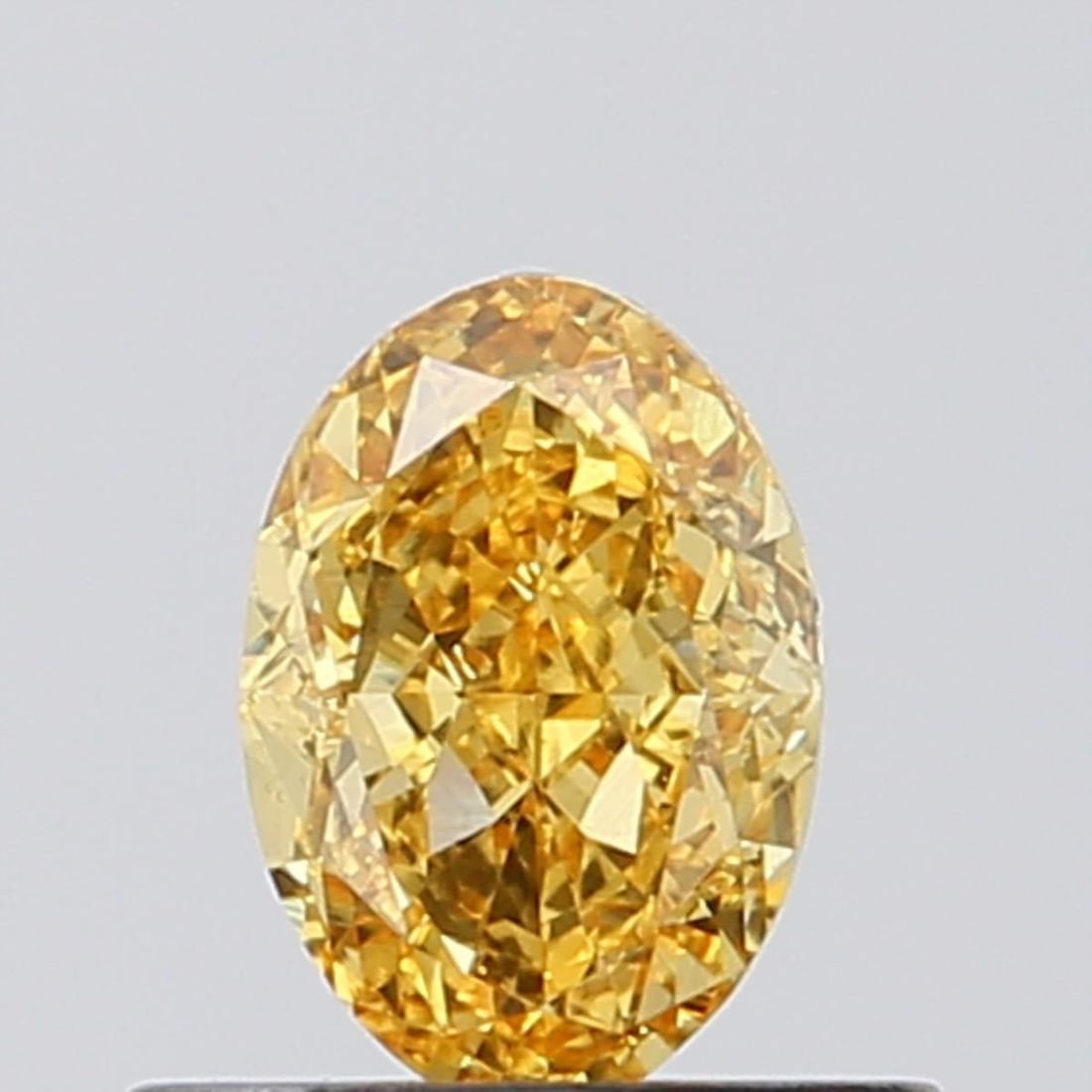 Loose Diamond - OVAL 0.61ct Fancy Vivid Yellow VVS2: Loose Diamond - OVAL 0.61ct Fancy Vivid Yellow VVS2 Source: This is a real non-mined Diamond that has been grown in a lab Shape: OVAL Carats: 0.61 Color: Fancy Vivid Yellow Certification: NONE Video: