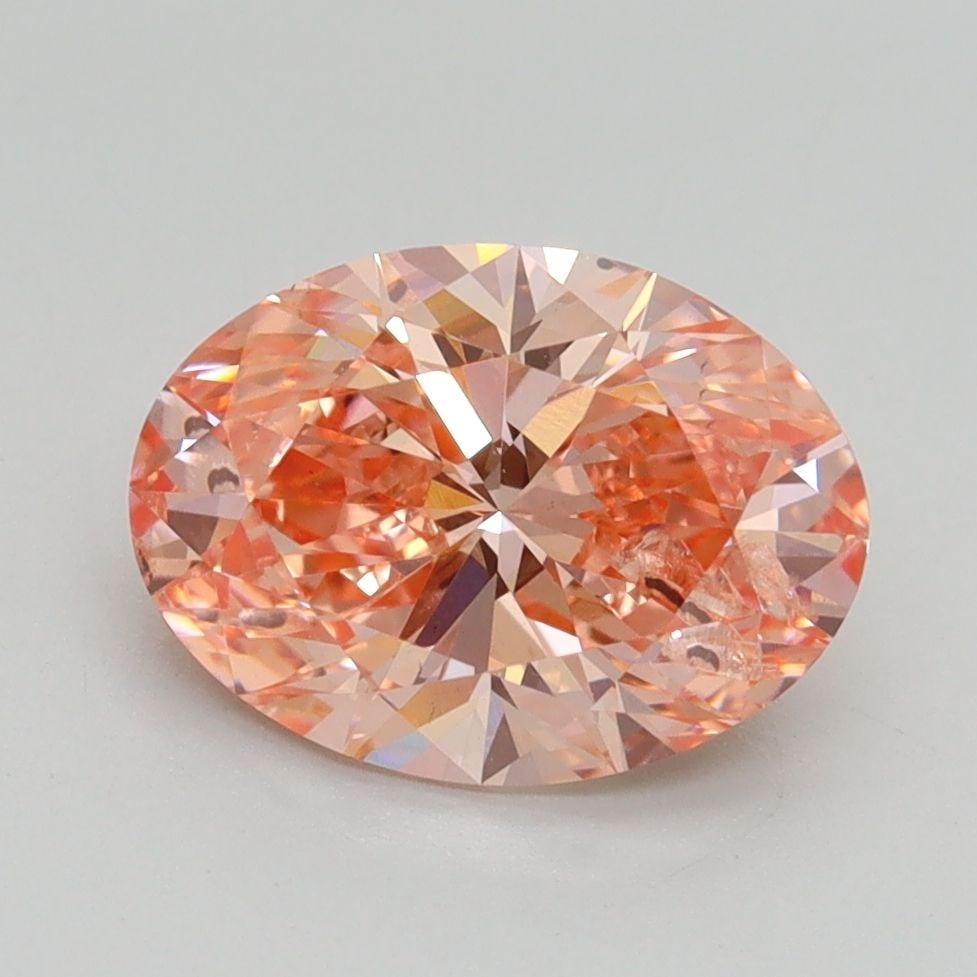 Loose Diamond - OVAL 2.1ct Fancy Vivid Pink SI2: Loose Diamond - OVAL 2.1ct Fancy Vivid Pink SI2 Source: This is a real non-mined Diamond that has been grown in a lab Shape: OVAL Carats: 2.1 Color: Fancy Vivid Pink Certification: IGI Video: