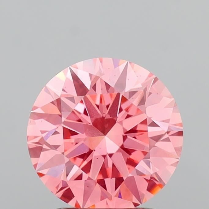 Ideal Loose Diamond - ROUND 2.09ct Fancy Vivid Pink VS2: Ideal Loose Diamond - ROUND 2.09ct Fancy Vivid Pink VS2 Source: This is a real non-mined Diamond that has been grown in a lab Shape: ROUND Carats: 2.09 Color: Fancy Vivid Pink Certification: IGI Video