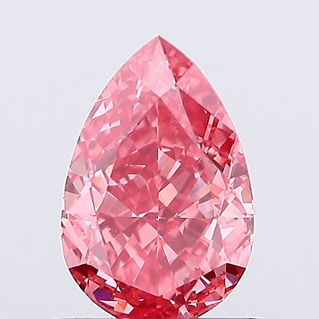 Loose Diamond - PEAR 1.07ct Fancy Vivid Pink VVS2: Loose Diamond - PEAR 1.07ct Fancy Vivid Pink VVS2 Source: This is a real non-mined Diamond that has been grown in a lab Shape: PEAR Carats: 1.07 Color: Fancy Vivid Pink Certification: IGI Video: