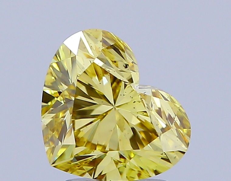 Loose Diamond - HEART 2.05ct Fancy Yellow I1: Loose Diamond - HEART 2.05ct Fancy Yellow I1 Source: This is a real non-mined Diamond that has been grown in a lab Shape: HEART Carats: 2.05 Color: Fancy Yellow Certification: NONE Video:
