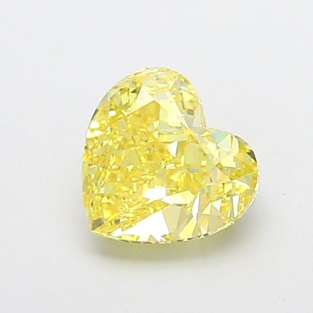 Loose Diamond - HEART 1.73ct Fancy Vivid Yellow VS2: Loose Diamond - HEART 1.73ct Fancy Vivid Yellow VS2 Source: This is a real non-mined Diamond that has been grown in a lab Shape: HEART Carats: 1.73 Color: Fancy Vivid Yellow Certification: IGI Video: