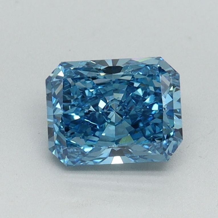Loose Diamond - RADIANT 1.0ct Fancy Vivid Blue VS2: Loose Diamond - RADIANT 1.0ct Fancy Vivid Blue VS2 Source: This is a real non-mined Diamond that has been grown in a lab Shape: RADIANT Carats: 1.0 Color: Fancy Vivid Blue Certification: IGI Video: