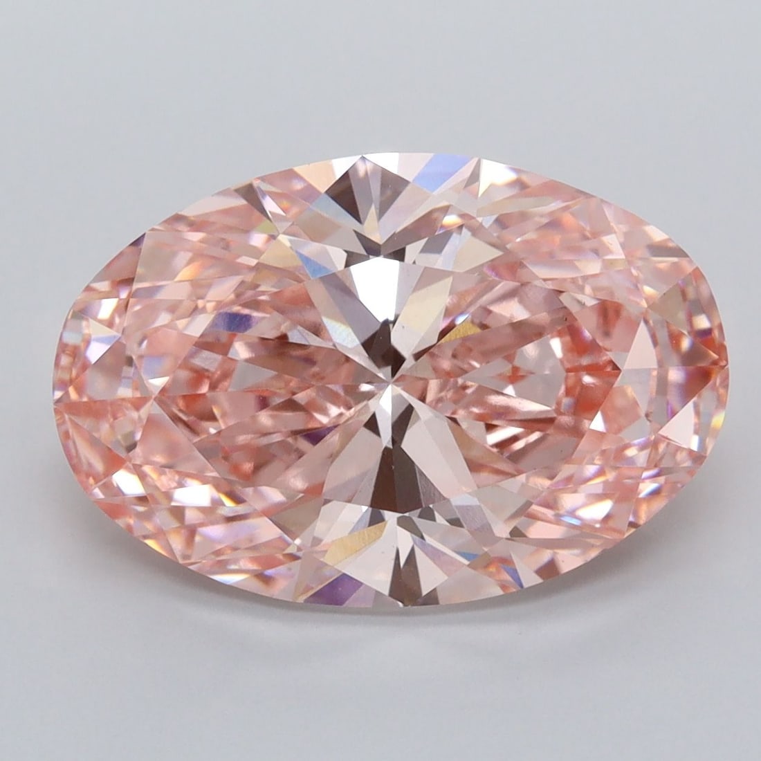 Loose Diamond - OVAL 6.02ct Fancy Vivid Pink VS1: Loose Diamond - OVAL 6.02ct Fancy Vivid Pink VS1 Source: This is a real non-mined Diamond that has been grown in a lab Shape: OVAL Carats: 6.02 Color: Fancy Vivid Pink Certification: IGI Video: