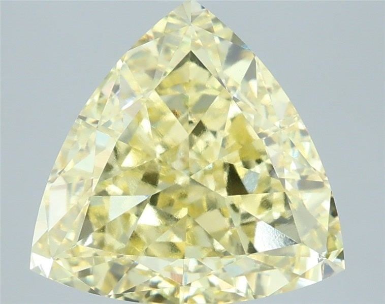 Loose Diamond - TRIANGULAR 5.02ct Fancy Yellow VVS2: Loose Diamond - TRIANGULAR 5.02ct Fancy Yellow VVS2 Source: This is a real non-mined Diamond that has been grown in a lab Shape: TRIANGULAR Carats: 5.02 Color: Fancy Yellow Certification: IGI Video:
