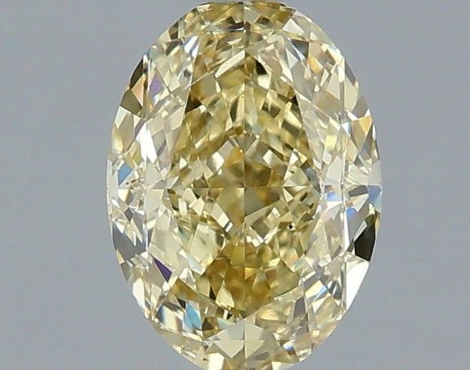 Loose Diamond - OVAL 1.06ct Fancy Yellow VS1: Loose Diamond - OVAL 1.06ct Fancy Yellow VS1 Source: This is a real non-mined Diamond that has been grown in a lab Shape: OVAL Carats: 1.06 Color: Fancy Yellow Certification: IGI Video: