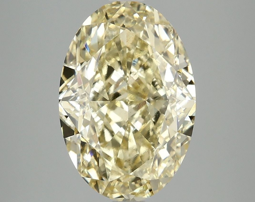Loose Diamond - OVAL 5.08ct Fancy Intense Yellow VS1: Loose Diamond - OVAL 5.08ct Fancy Intense Yellow VS1 Source: This is a real non-mined Diamond that has been grown in a lab Shape: OVAL Carats: 5.08 Color: Fancy Intense Yellow Certification: IGI Video
