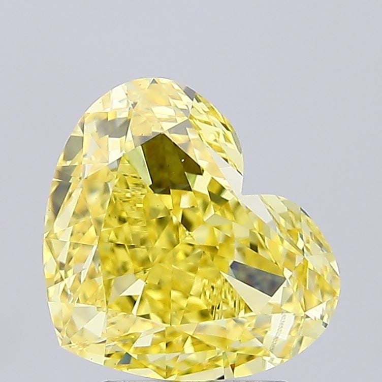Loose Diamond - HEART 3.64ct Fancy Vivid Yellow VS1: Loose Diamond - HEART 3.64ct Fancy Vivid Yellow VS1 Source: This is a real non-mined Diamond that has been grown in a lab Shape: HEART Carats: 3.64 Color: Fancy Vivid Yellow Certification: IGI Video: