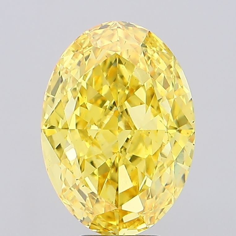 Loose Diamond - OVAL 8.04ct Fancy Vivid Yellow VS2: Loose Diamond - OVAL 8.04ct Fancy Vivid Yellow VS2 Source: This is a real non-mined Diamond that has been grown in a lab Shape: OVAL Carats: 8.04 Color: Fancy Vivid Yellow Certification: IGI Video:
