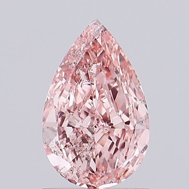 Loose Diamond - PEAR 1.0ct Fancy Vivid Pink SI1: Loose Diamond - PEAR 1.0ct Fancy Vivid Pink SI1 Source: This is a real non-mined Diamond that has been grown in a lab Shape: PEAR Carats: 1.0 Color: Fancy Vivid Pink Certification: IGI Video: Video