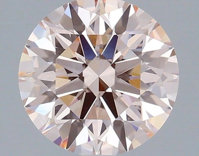 Ideal Loose Diamond - ROUND 2.05ct Fancy Pink VVS2: Ideal Loose Diamond - ROUND 2.05ct Fancy Pink VVS2 Source: This is a real non-mined Diamond that has been grown in a lab Shape: ROUND Carats: 2.05 Color: Fancy Pink Certification: IGI Video: