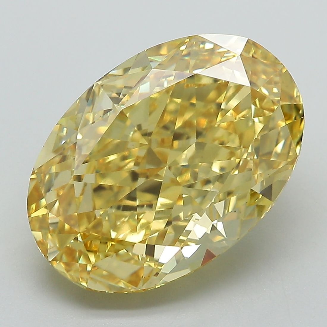 Loose Diamond - OVAL 7.94ct Fancy Vivid Yellow VS1: Loose Diamond - OVAL 7.94ct Fancy Vivid Yellow VS1 Source: This is a real non-mined Diamond that has been grown in a lab Shape: OVAL Carats: 7.94 Color: Fancy Vivid Yellow Certification: IGI Video: