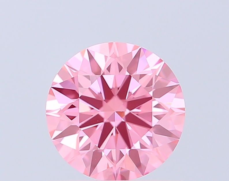 Ideal Loose Diamond - ROUND 1.09ct Fancy Vivid Pink VVS2: Ideal Loose Diamond - ROUND 1.09ct Fancy Vivid Pink VVS2 Source: This is a real non-mined Diamond that has been grown in a lab Shape: ROUND Carats: 1.09 Color: Fancy Vivid Pink Certification: IGI