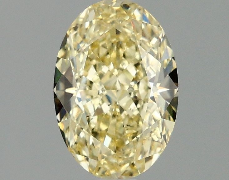 Loose Diamond - OVAL 1.59ct Fancy Intense Yellow VS2: Loose Diamond - OVAL 1.59ct Fancy Intense Yellow VS2 Source: This is a real non-mined Diamond that has been grown in a lab Shape: OVAL Carats: 1.59 Color: Fancy Intense Yellow Certification: IGI Video
