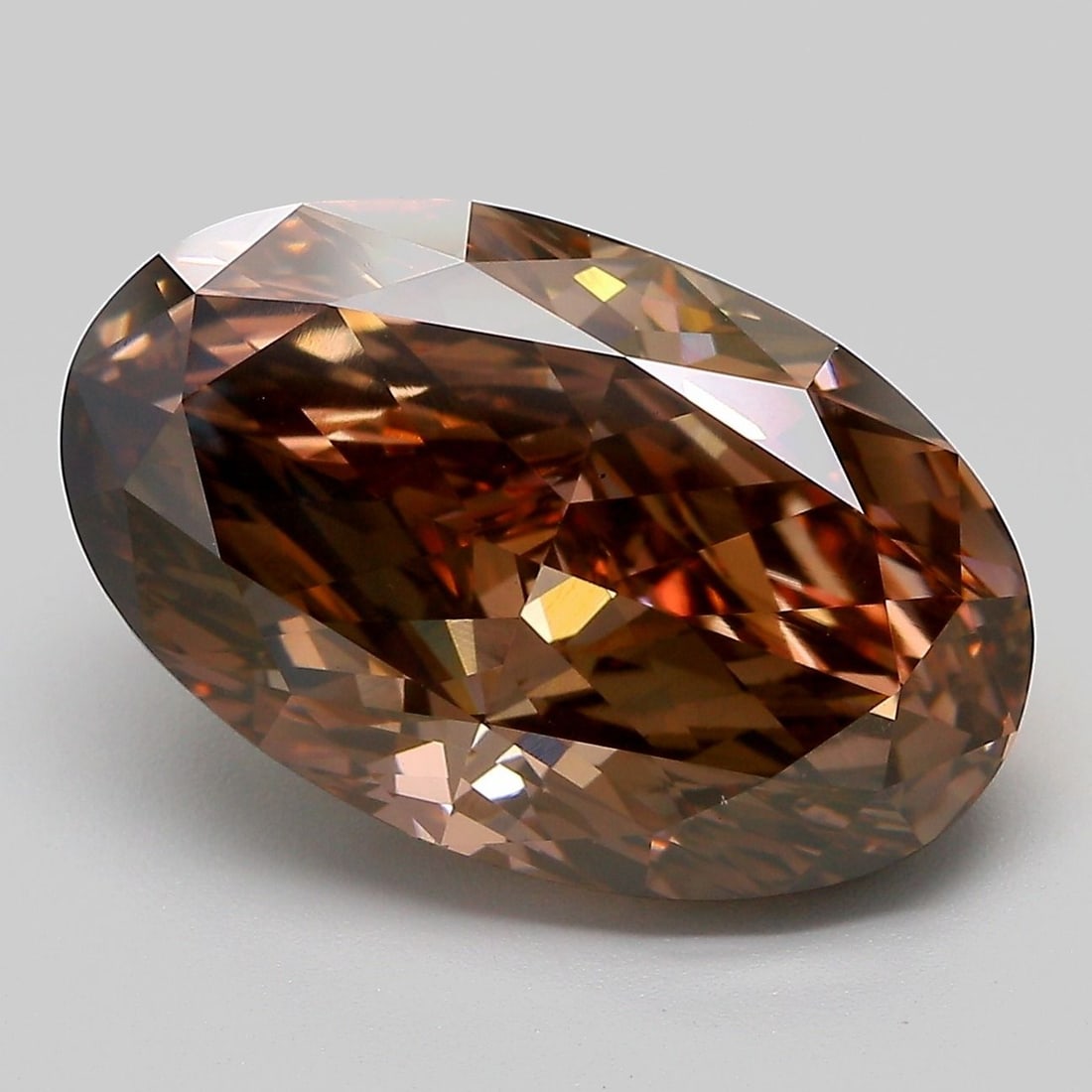 Loose Diamond - OVAL 8.96ct Fancy Brown VS1: Loose Diamond - OVAL 8.96ct Fancy Brown VS1 Source: This is a real non-mined Diamond that has been grown in a lab Shape: OVAL Carats: 8.96 Color: Fancy Brown Certification: IGI The Diamond Depot Guara