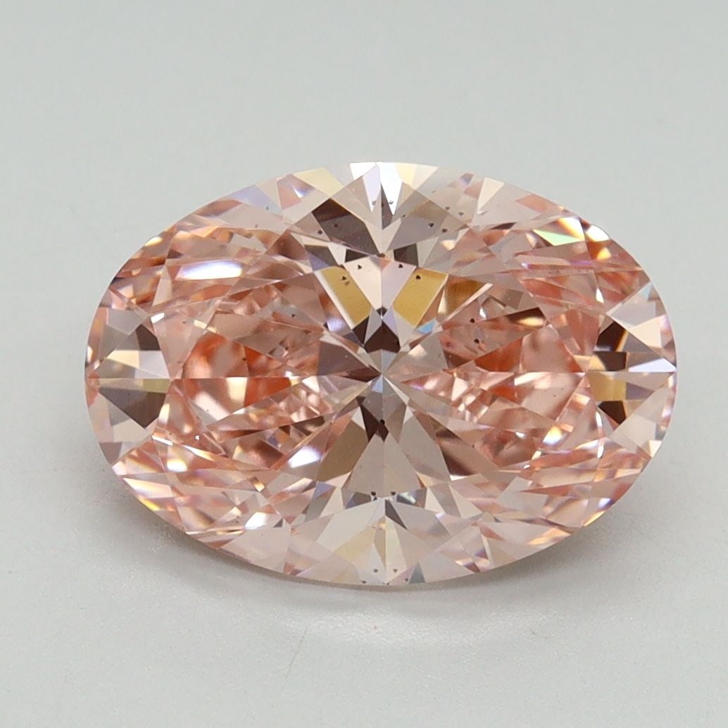 Loose Diamond - OVAL 3.06ct Fancy Vivid Pink VS2: Loose Diamond - OVAL 3.06ct Fancy Vivid Pink VS2 Source: This is a real non-mined Diamond that has been grown in a lab Shape: OVAL Carats: 3.06 Color: Fancy Vivid Pink Certification: IGI Video: