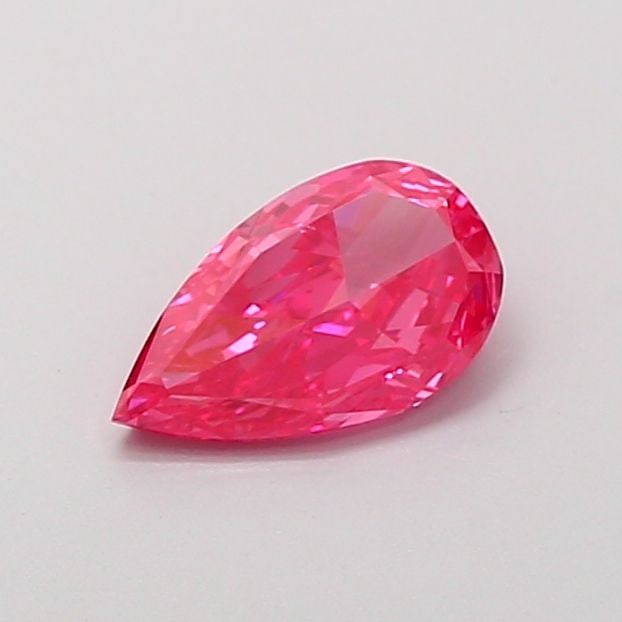 Loose Diamond - PEAR 0.91ct Fancy Vivid Pink VS2: Loose Diamond - PEAR 0.91ct Fancy Vivid Pink VS2 Source: This is a real non-mined Diamond that has been grown in a lab Shape: PEAR Carats: 0.91 Color: Fancy Vivid Pink Certification: IGI Video: