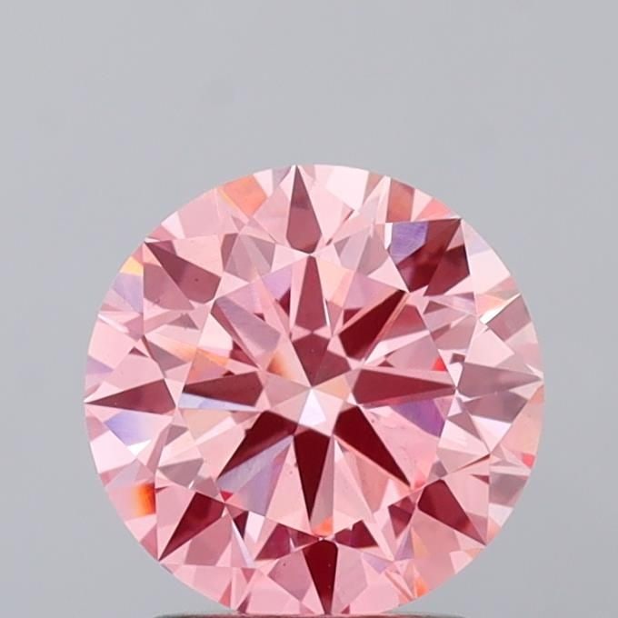 Loose Diamond - ROUND 1.99ct Fancy Vivid Pink VS2: Loose Diamond - ROUND 1.99ct Fancy Vivid Pink VS2 Source: This is a real non-mined Diamond that has been grown in a lab Shape: ROUND Carats: 1.99 Color: Fancy Vivid Pink Certification: IGI Video: