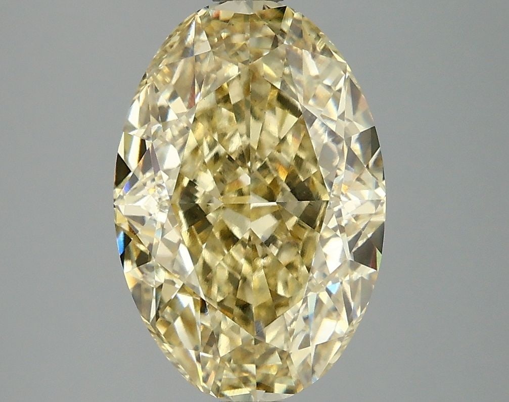 Loose Diamond - OVAL 4.06ct Fancy Intense Yellow VS1: Loose Diamond - OVAL 4.06ct Fancy Intense Yellow VS1 Source: This is a real non-mined Diamond that has been grown in a lab Shape: OVAL Carats: 4.06 Color: Fancy Intense Yellow Certification: IGI Video