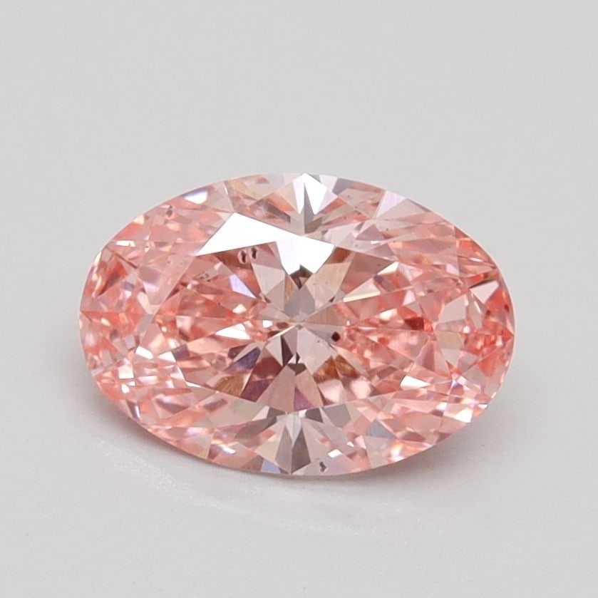 Loose Diamond - OVAL 1.03ct Fancy Vivid Pink SI1: Loose Diamond - OVAL 1.03ct Fancy Vivid Pink SI1 Source: This is a real non-mined Diamond that has been grown in a lab Shape: OVAL Carats: 1.03 Color: Fancy Vivid Pink Certification: IGI Video:
