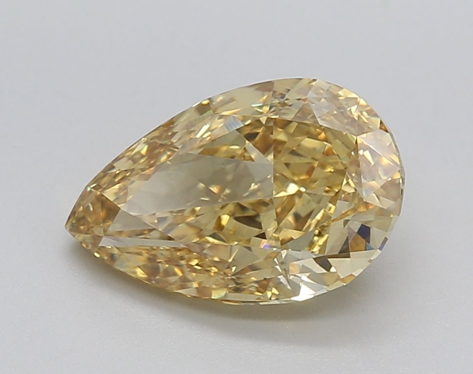 Loose Diamond - PEAR 1.54ct Fancy Vivid Yellow VS2: Loose Diamond - PEAR 1.54ct Fancy Vivid Yellow VS2 Source: This is a real non-mined Diamond that has been grown in a lab Shape: PEAR Carats: 1.54 Color: Fancy Vivid Yellow Certification: IGI Video: