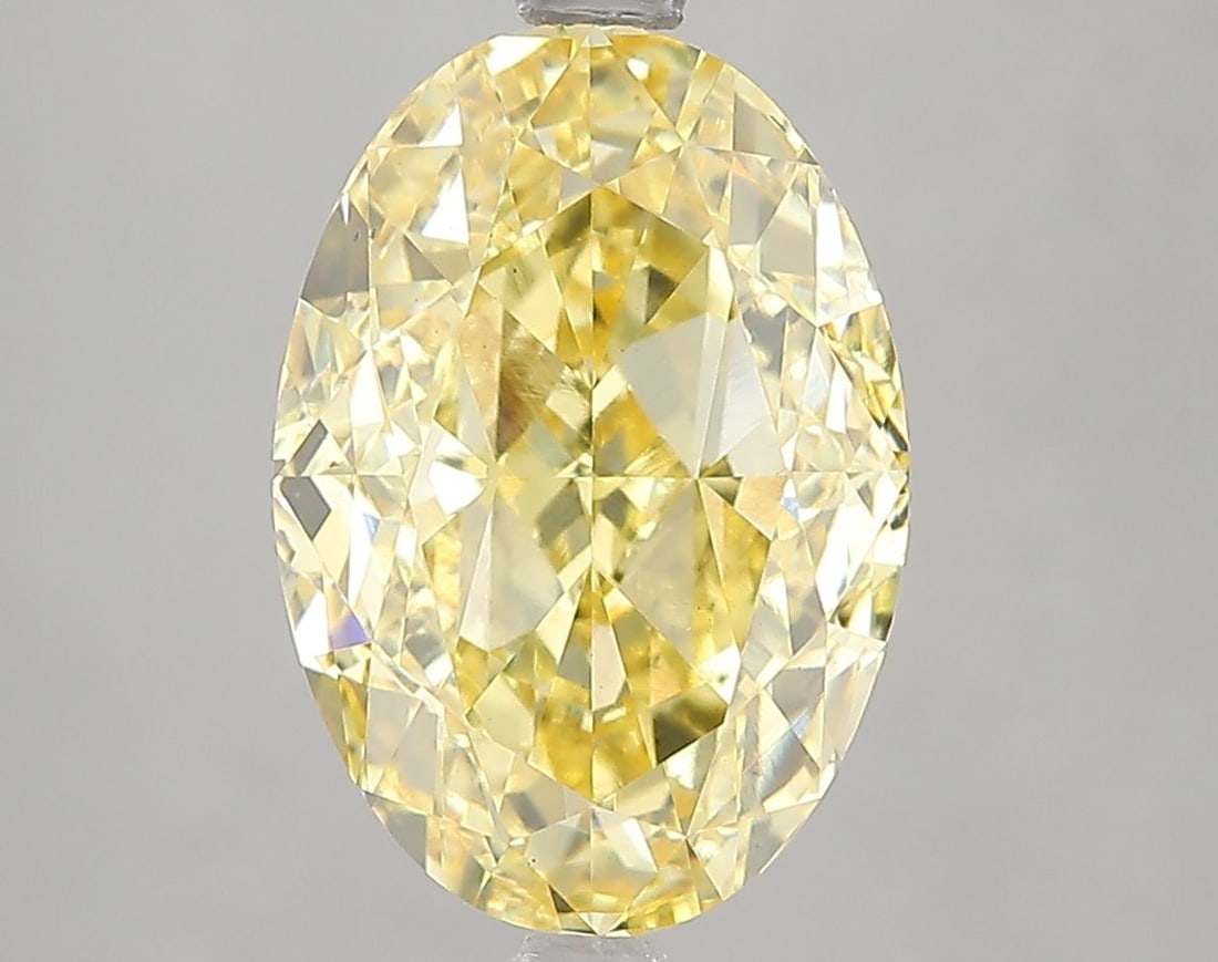 Loose Diamond - OVAL 5.01ct Fancy Vivid Yellow VS2: Loose Diamond - OVAL 5.01ct Fancy Vivid Yellow VS2 Source: This is a real non-mined Diamond that has been grown in a lab Shape: OVAL Carats: 5.01 Color: Fancy Vivid Yellow Certification: IGI Video: