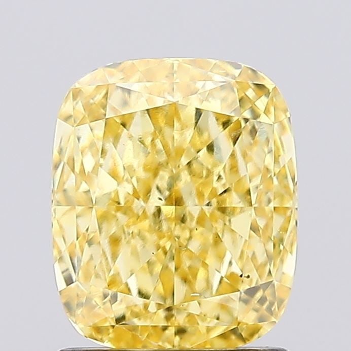 Loose Diamond - CUSHION MODIFIED 1.3ct Fancy Vivid Yellow VS1: Loose Diamond - CUSHION MODIFIED 1.3ct Fancy Vivid Yellow VS1 Source: This is a real non-mined Diamond that has been grown in a lab Shape: CUSHION MODIFIED Carats: 1.3 Color: Fancy Vivid Yellow Certif