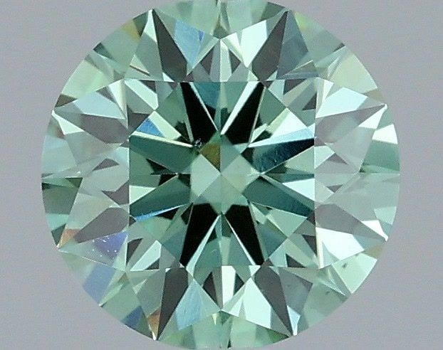 Ideal Loose Diamond - ROUND 1.03ct Fancy Vivid Green VS1: Ideal Loose Diamond - ROUND 1.03ct Fancy Vivid Green VS1 Source: This is a real non-mined Diamond that has been grown in a lab Shape: ROUND Carats: 1.03 Color: Fancy Vivid Green Certification: IGI Vid