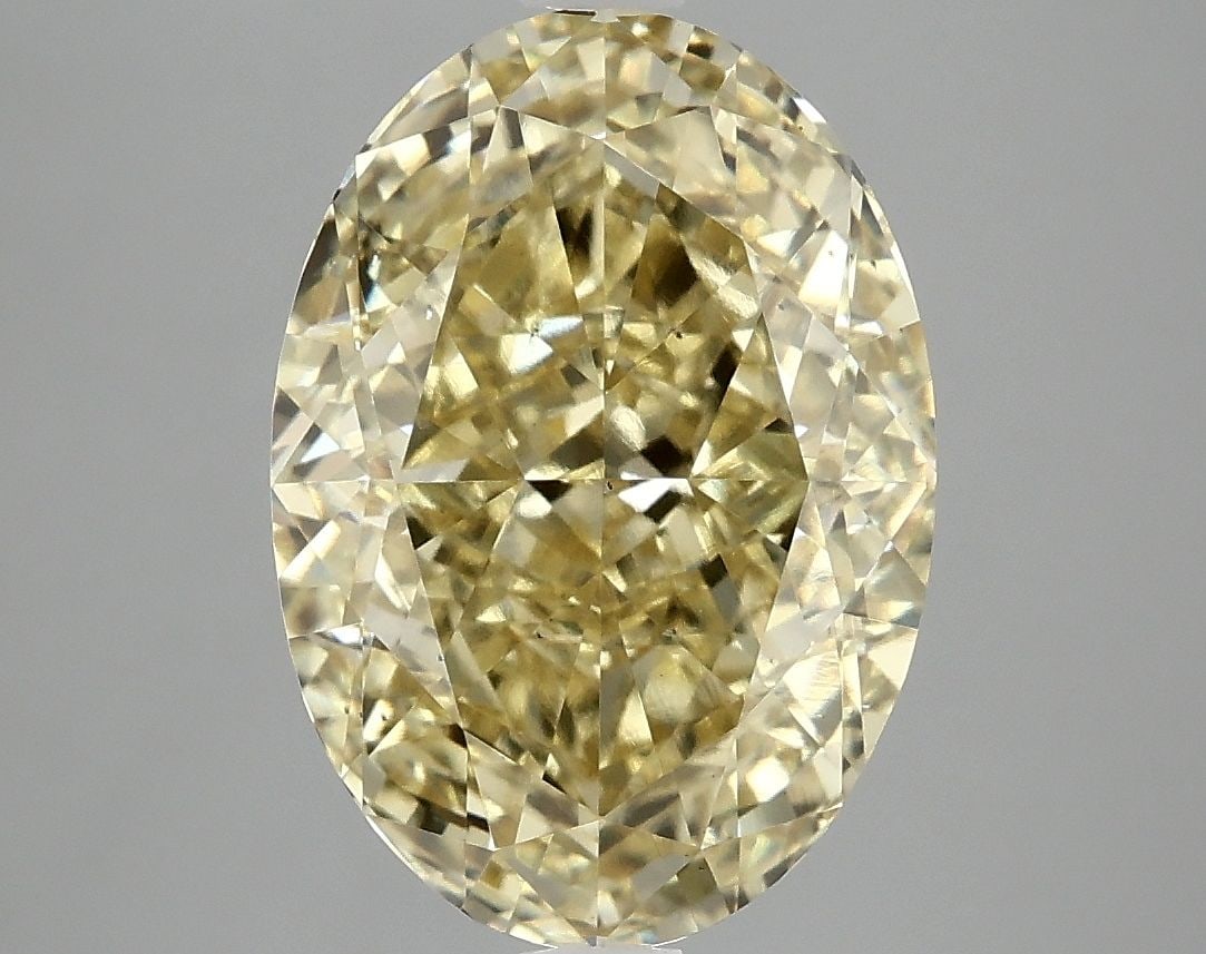 Loose Diamond - OVAL 5.05ct Fancy Vivid Yellow VS2: Loose Diamond - OVAL 5.05ct Fancy Vivid Yellow VS2 Source: This is a real non-mined Diamond that has been grown in a lab Shape: OVAL Carats: 5.05 Color: Fancy Vivid Yellow Certification: IGI Video: