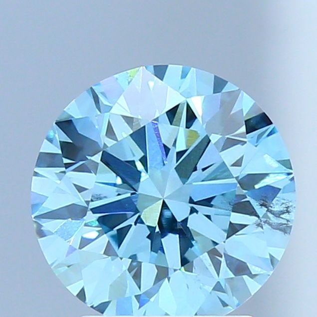 Ideal Loose Diamond - ROUND 2.0ct Fancy Vivid Blue SI1: Ideal Loose Diamond - ROUND 2.0ct Fancy Vivid Blue SI1 Source: This is a real non-mined Diamond that has been grown in a lab Shape: ROUND Carats: 2.0 Color: Fancy Vivid Blue Certification: IGI Video: