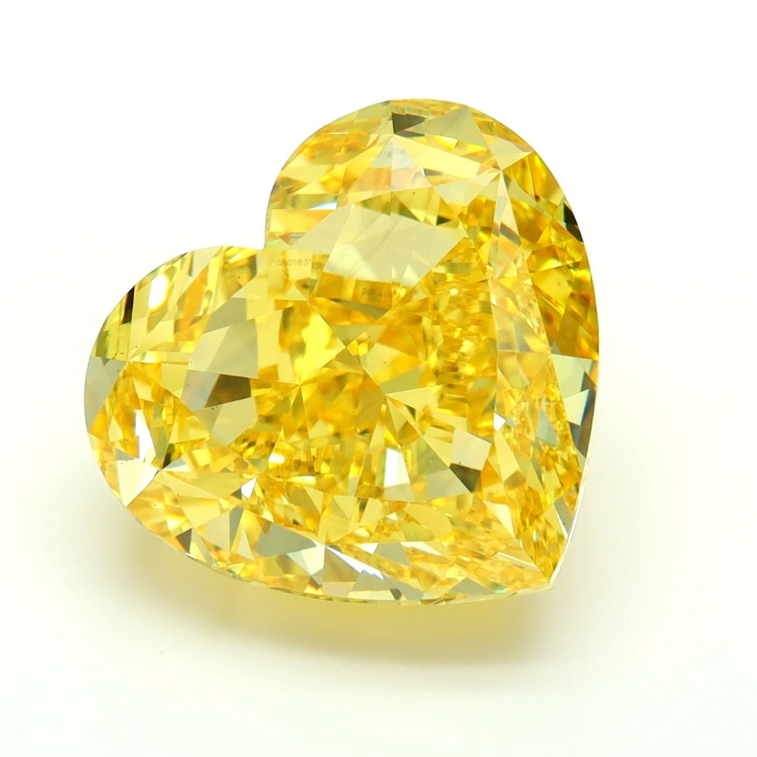 Loose Diamond - HEART 9.09ct Fancy Vivid Yellow VS1: Loose Diamond - HEART 9.09ct Fancy Vivid Yellow VS1 Source: This is a real non-mined Diamond that has been grown in a lab Shape: HEART Carats: 9.09 Color: Fancy Vivid Yellow Certification: IGI Video: