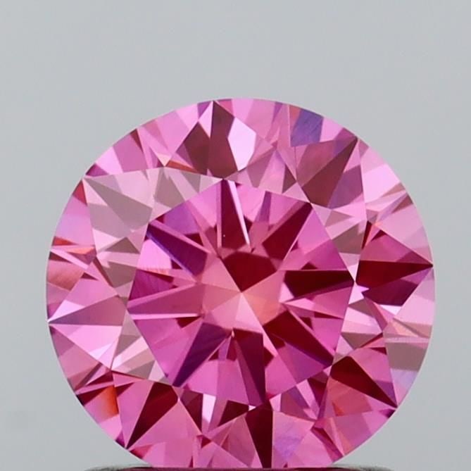 Ideal Loose Diamond - ROUND 1.08ct Fancy Vivid Pink VS1: Ideal Loose Diamond - ROUND 1.08ct Fancy Vivid Pink VS1 Source: This is a real non-mined Diamond that has been grown in a lab Shape: ROUND Carats: 1.08 Color: Fancy Vivid Pink Certification: IGI Video
