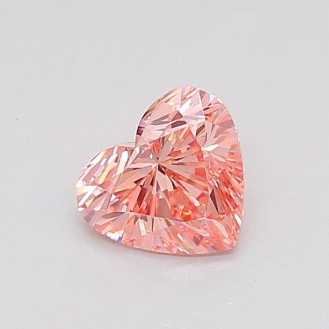 Loose Diamond - HEART 0.73ct Fancy Vivid Pink VS2: Loose Diamond - HEART 0.73ct Fancy Vivid Pink VS2 Source: This is a real non-mined Diamond that has been grown in a lab Shape: HEART Carats: 0.73 Color: Fancy Vivid Pink Certification: IGI Video: