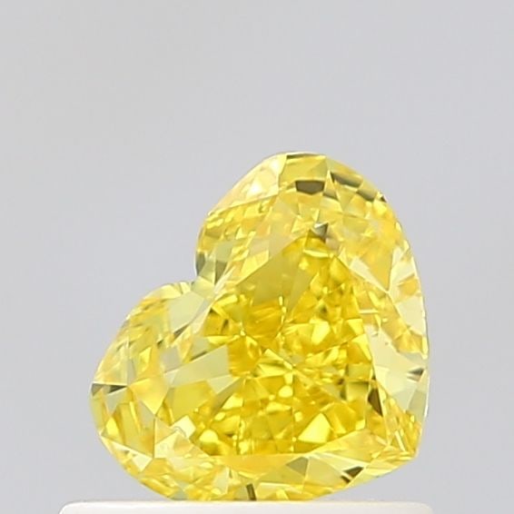 Loose Diamond - HEART 0.66ct Fancy Vivid Yellow VVS2: Loose Diamond - HEART 0.66ct Fancy Vivid Yellow VVS2 Source: This is a real non-mined Diamond that has been grown in a lab Shape: HEART Carats: 0.66 Color: Fancy Vivid Yellow Certification: NONE