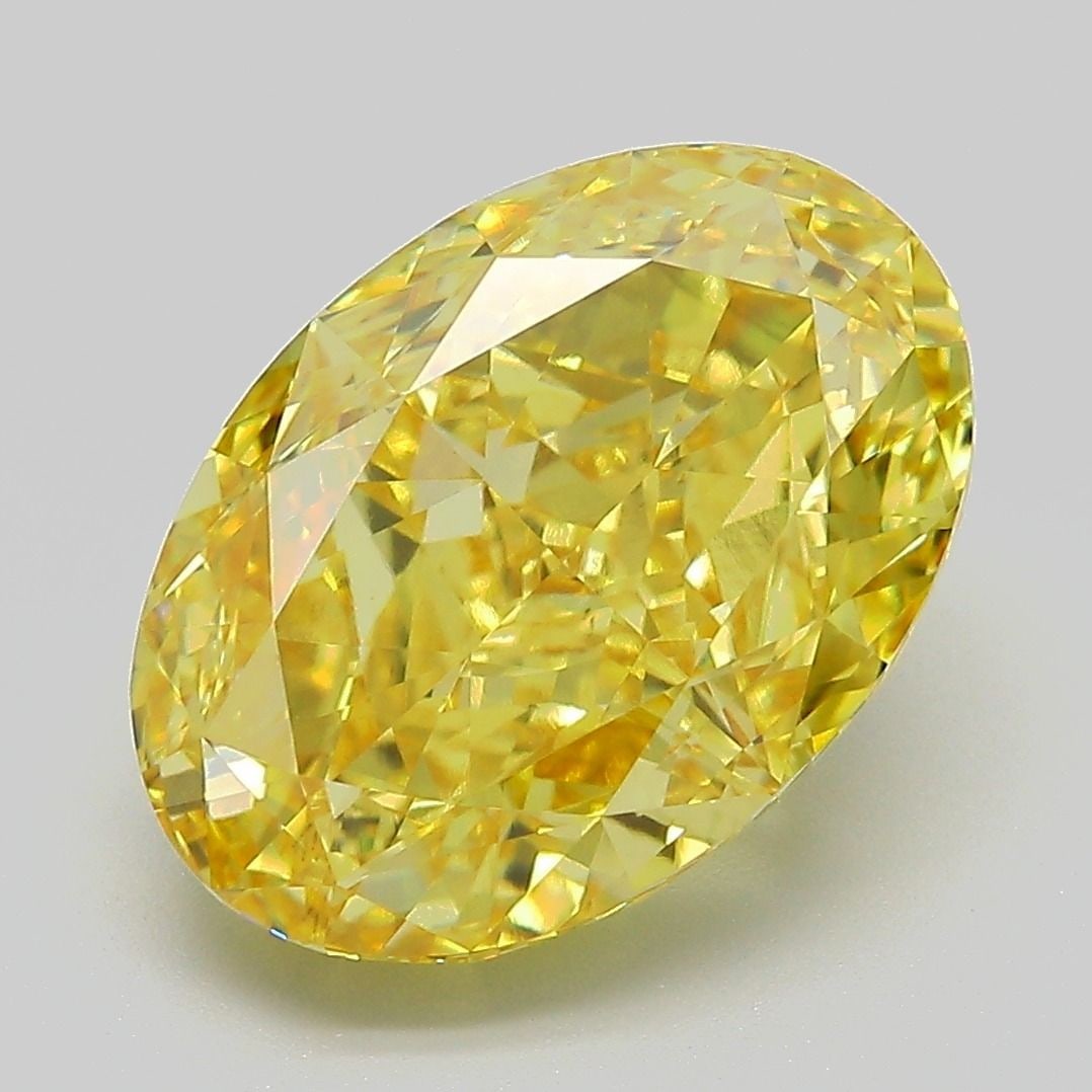 Loose Diamond - OVAL 6.52ct Fancy Vivid Yellow VVS2: Loose Diamond - OVAL 6.52ct Fancy Vivid Yellow VVS2 Source: This is a real non-mined Diamond that has been grown in a lab Shape: OVAL Carats: 6.52 Color: Fancy Vivid Yellow Certification: IGI Video: