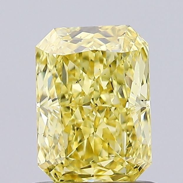Loose Diamond - RADIANT 1.0ct Fancy Vivid Yellow VS2: Loose Diamond - RADIANT 1.0ct Fancy Vivid Yellow VS2 Source: This is a real non-mined Diamond that has been grown in a lab Shape: RADIANT Carats: 1.0 Color: Fancy Vivid Yellow Certification: IGI Video