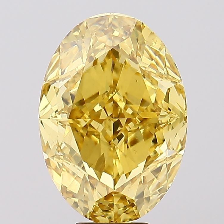 Loose Diamond - OVAL 11.28ct Fancy Vivid Yellow VS1: Loose Diamond - OVAL 11.28ct Fancy Vivid Yellow VS1 Source: This is a real non-mined Diamond that has been grown in a lab Shape: OVAL Carats: 11.28 Color: Fancy Vivid Yellow Certification: IGI Video: