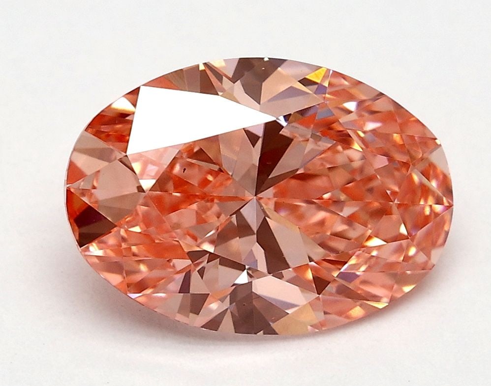 Loose Diamond - OVAL 1.8ct Fancy Vivid Pink VS1: Loose Diamond - OVAL 1.8ct Fancy Vivid Pink VS1 Source: This is a real non-mined Diamond that has been grown in a lab Shape: OVAL Carats: 1.8 Color: Fancy Vivid Pink Certification: IGI Video: