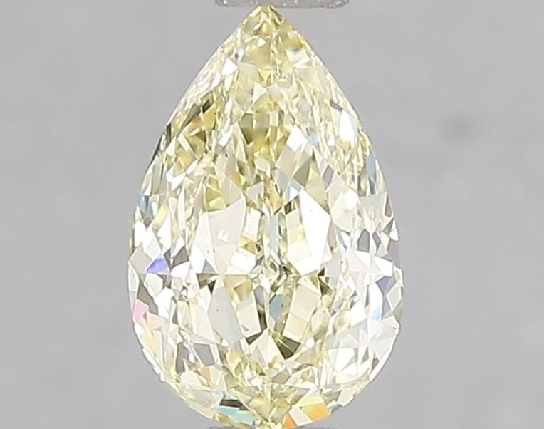 Loose Diamond - PEAR 1.0ct Fancy Yellow VS2: Loose Diamond - PEAR 1.0ct Fancy Yellow VS2 Source: This is a real non-mined Diamond that has been grown in a lab Shape: PEAR Carats: 1.0 Color: Fancy Yellow Certification: IGI Video: