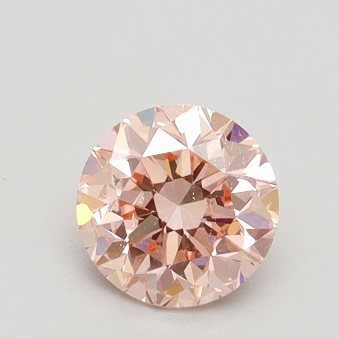 Loose Diamond - ROUND 0.71ct Fancy Intense Pink SI2: Loose Diamond - ROUND 0.71ct Fancy Intense Pink SI2 Source: This is a real non-mined Diamond that has been grown in a lab Shape: ROUND Carats: 0.71 Color: Fancy Intense Pink Certification: IGI Video: