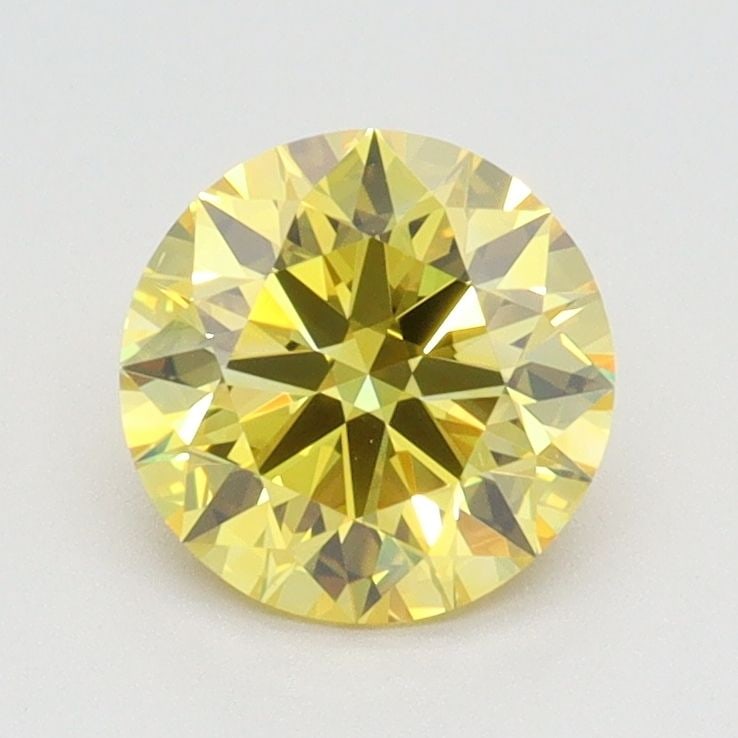 Loose Diamond - ROUND 1.15ct Fancy Vivid Yellow VS1: Loose Diamond - ROUND 1.15ct Fancy Vivid Yellow VS1 Source: This is a real non-mined Diamond that has been grown in a lab Shape: ROUND Carats: 1.15 Color: Fancy Vivid Yellow Certification: IGI Video: