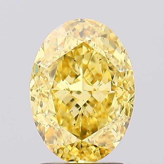 Loose Diamond - OVAL 2.69ct Fancy Vivid Yellow VS2: Loose Diamond - OVAL 2.69ct Fancy Vivid Yellow VS2 Source: This is a real non-mined Diamond that has been grown in a lab Shape: OVAL Carats: 2.69 Color: Fancy Vivid Yellow Certification: IGI Video: