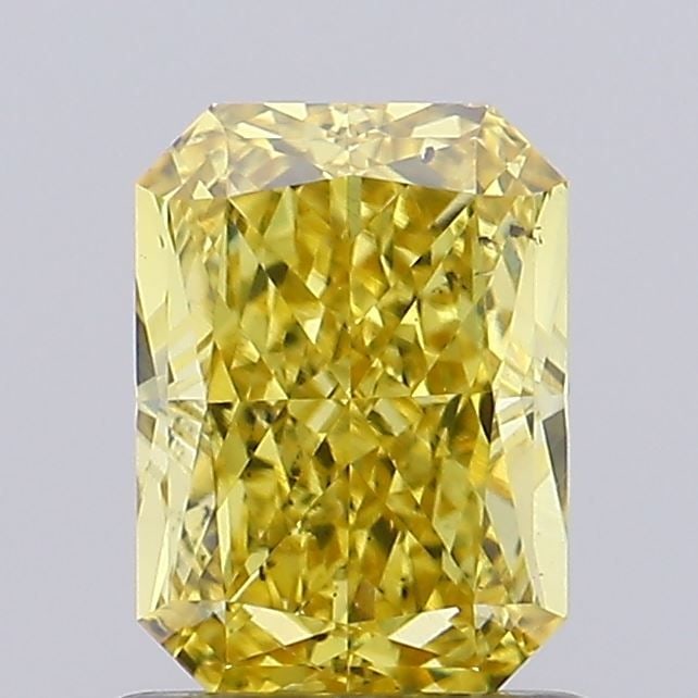 Loose Diamond - RADIANT 1.0ct Fancy Vivid Yellow SI1: Loose Diamond - RADIANT 1.0ct Fancy Vivid Yellow SI1 Source: This is a real non-mined Diamond that has been grown in a lab Shape: RADIANT Carats: 1.0 Color: Fancy Vivid Yellow Certification: IGI Video