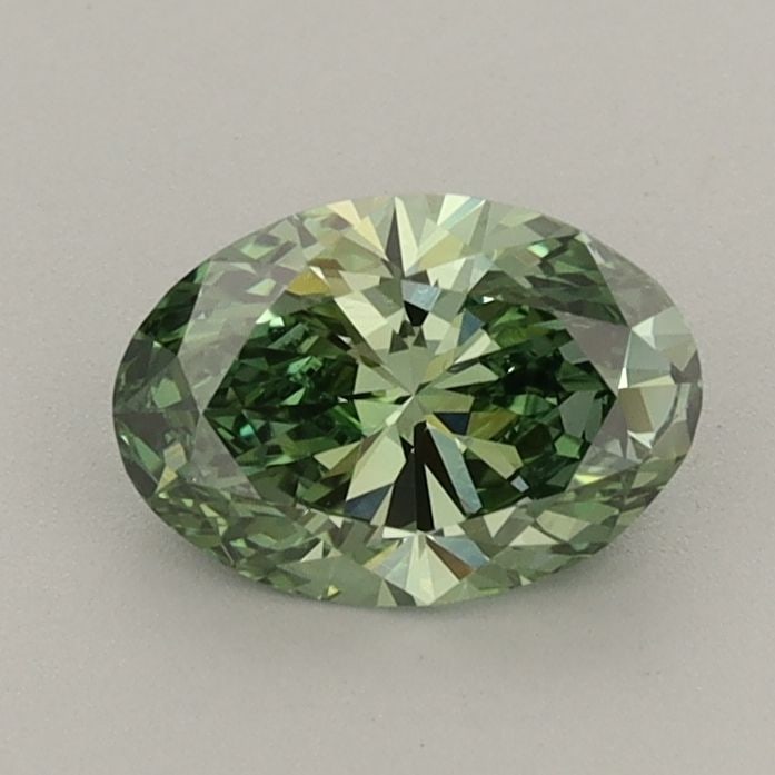 Loose Diamond - OVAL 0.86ct Fancy Vivid Green VVS1: Loose Diamond - OVAL 0.86ct Fancy Vivid Green VVS1 Source: This is a real non-mined Diamond that has been grown in a lab Shape: OVAL Carats: 0.86 Color: Fancy Vivid Green Certification: IGI The Diamon