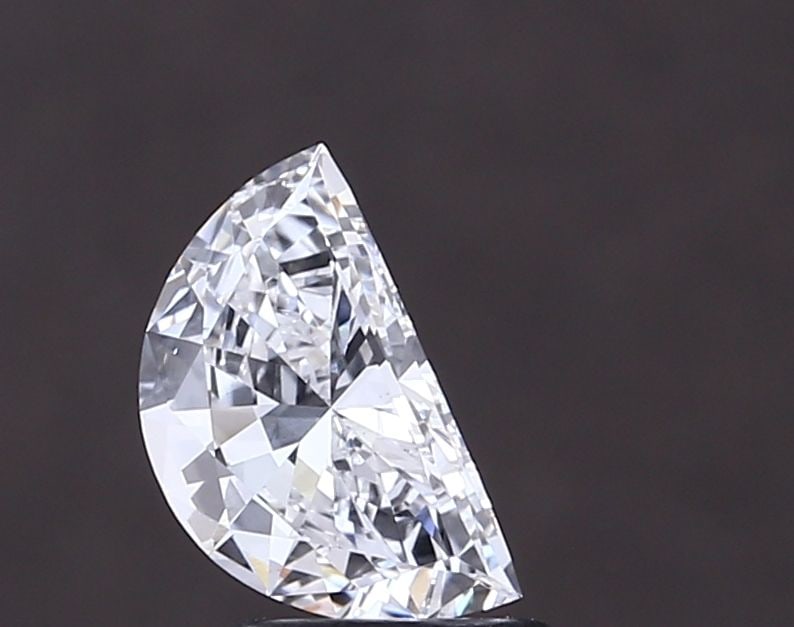 Loose Diamond - HALF MOON 0.94ct E VVS1: Loose Diamond - HALF MOON 0.94ct E VVS1 Source: This is a real non-mined Diamond that has been grown in a lab Shape: HALF MOON Carats: 0.94 Color: E Clarity: VVS1 Certification: IGI Video: